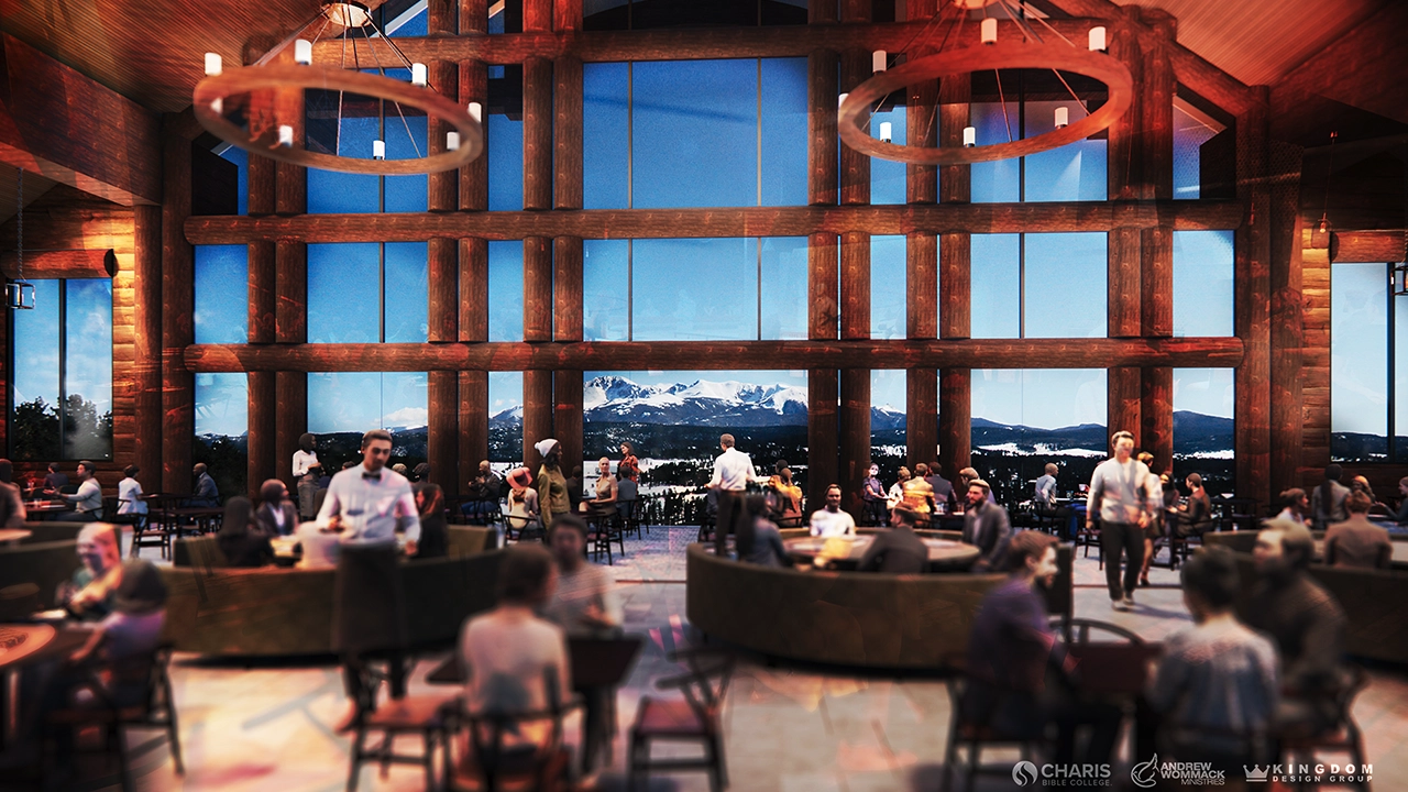 A spacious lodge-style dining hall with high wooden beams, large windows showcasing a stunning mountain view, and warm lighting. People are dining, conversing, and being served in a cozy, rustic setting with circular chandeliers and communal seating.